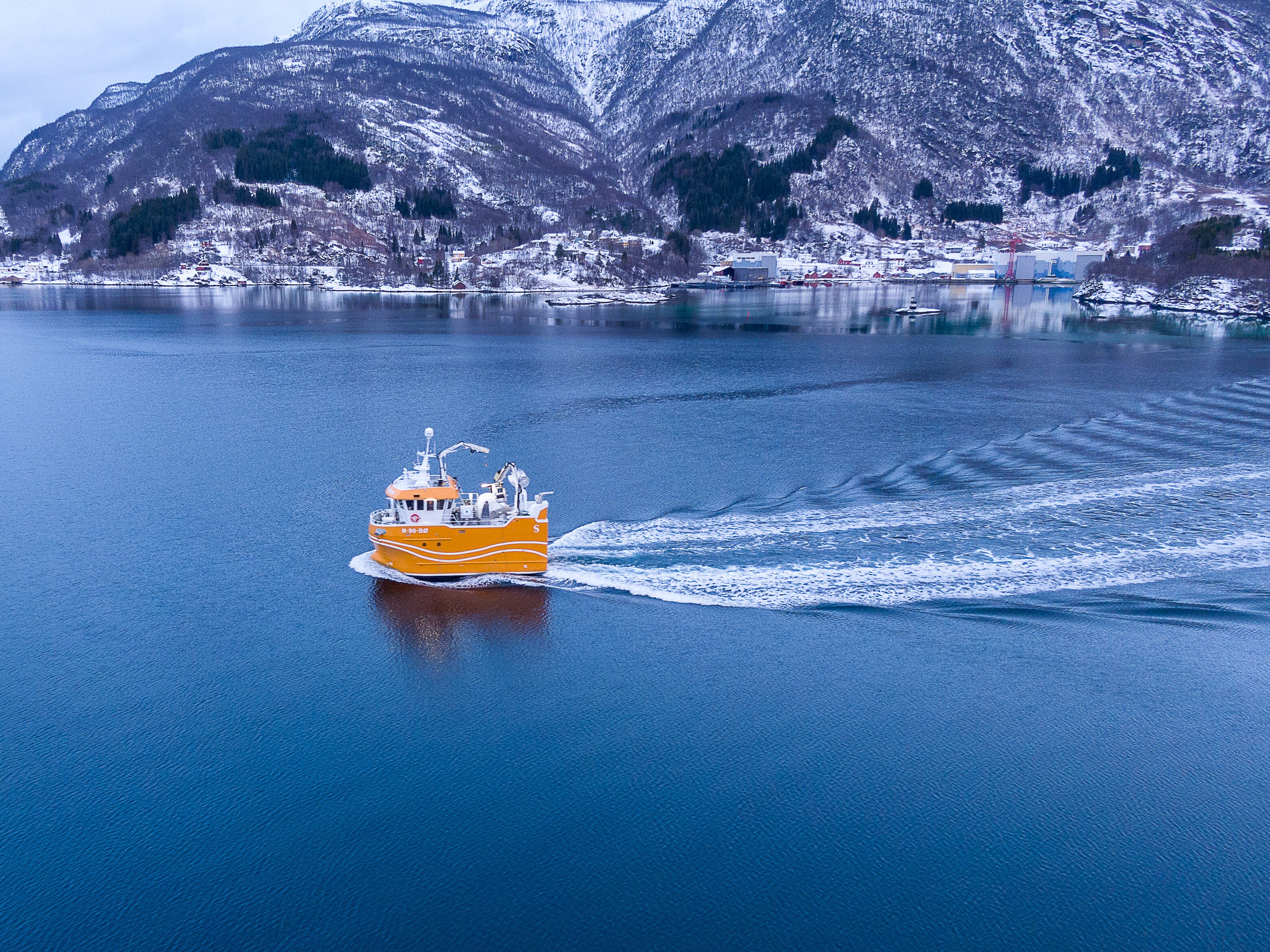 Fishing boat sailing from harbor